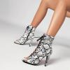 imageSHEMEE Womens Stiletto High Heels Peep Toe Ankle Booties Fashion Heeled Sandals Zipper Summer Short Boots LaceUp Dance ShoesWhite Snake